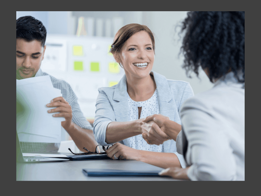 Image of client and marketing agency doing a business deal